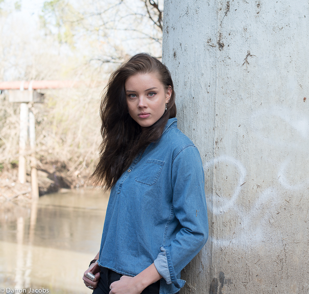 Urban Decay - Supporting Role The photo session's theme "Urban Decay" is well portrayed in this image with the concrete column with graffiti being used in...